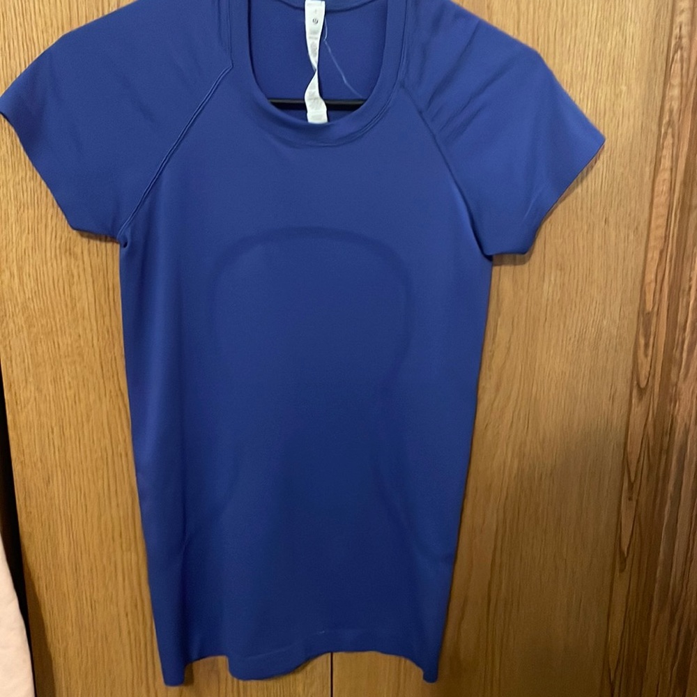 Lululemon NWOT swiftly tech size 4